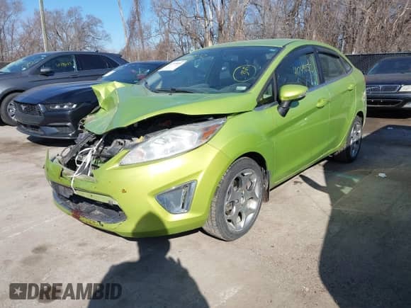 2011 Ford Fiesta SEL with VIN 3FADP4CJ0BM113915, listed as a IAAI auction lot 41749052 with 239,010 mi miles and . Bid and sale history available at DreamBid. Image 2.