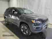 2018 Jeep Compass Trailhawk with VIN 3C4NJDDB8JT264061, listed as a Copart auction lot 68252765 with 69,347 mi miles and Clean title. Bid and sale history available at DreamBid. Image 4.