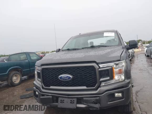 2018 Ford F-150 XL with VIN 1FTEW1CP6JKE44024, listed as a IAAI auction lot 42484385 with 104,914 mi miles and . Bid and sale history available at DreamBid. Image 12.
