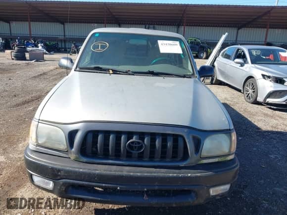 2002 Toyota Tacoma with VIN 5TENL42N32Z074285, listed as a IAAI auction lot 43438609 with 160,565 mi miles and . Bid and sale history available at DreamBid. Image 6.