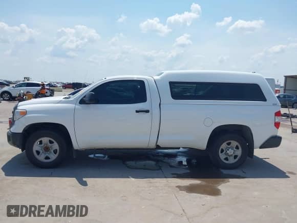 2014 Toyota Tundra with VIN 5TFNU5F16EX032487, listed as a IAAI auction lot 42988213 with 473,889 mi miles and . Bid and sale history available at DreamBid. Image 14.