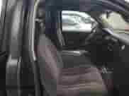 2002 Dodge Dakota z VIN 1B7FL16X32S557570, wystawiony jako Copart lot #88974295 z przebiegiem 201 791 mil mil oraz Szkoda całkowita • Salvage title. Historia ofert i sprzedaży dostępna na DreamBid. Obrazek 10.