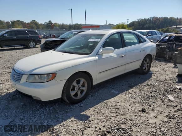 2006 Hyundai Azera SE с VIN KMHFC46F46A075884, выставлен на аукционе Copart как лот 77214814 с пробегом 199 432 миль миль и Списание • Salvage title. История ставок и продаж доступна на DreamBid. Изображение 1.