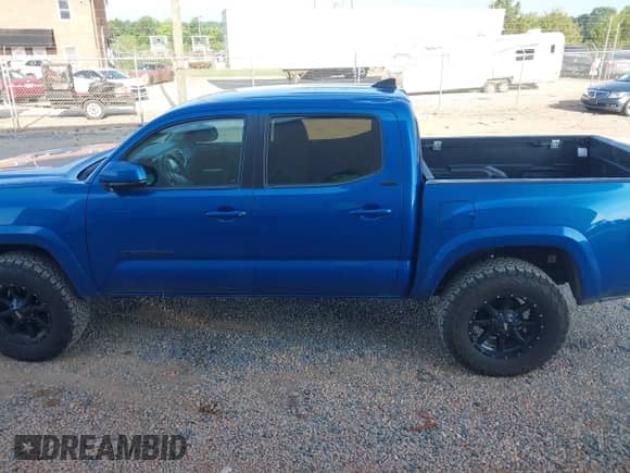 2017 Toyota Tacoma SR5 with VIN 3TMAZ5CN5HM051985, listed as a IAAI auction lot 42614603 with 126,513 mi miles and . Bid and sale history available at DreamBid. Image 14.