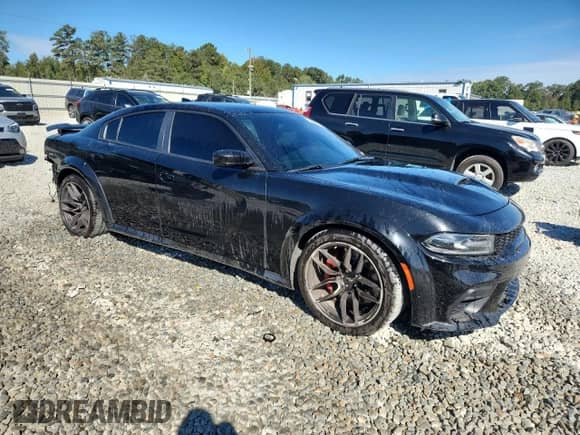 2021 Dodge Charger Scat Pack Widebody with VIN 2C3CDXGJXMH591405, listed as a Copart auction lot 84408215 with 75,330 mi miles and Salvage title. Bid and sale history available at DreamBid. Image 4.