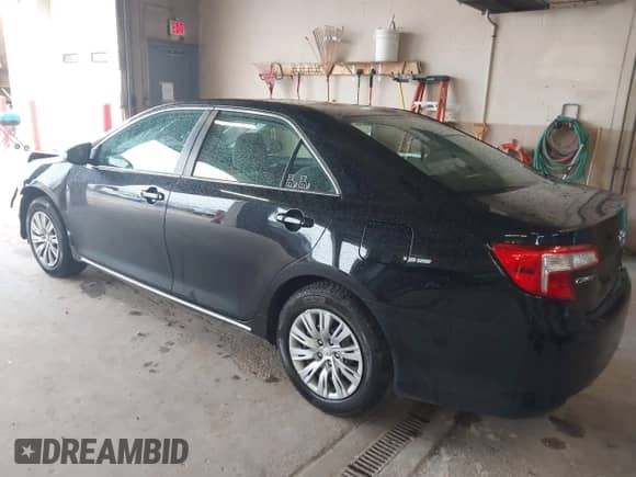 2012 Toyota Camry SE with VIN 4T1BF1FK7CU032801, listed as a IAAI auction lot 43118574 with 136,772 mi miles and . Bid and sale history available at DreamBid. Image 3.
