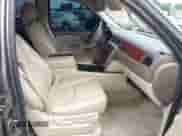 2011 Chevrolet Tahoe LT with VIN 1GNSCBE00BR397882, listed as a IAAI auction lot 42818583 with 191,303 mi miles and . Bid and sale history available at DreamBid. Image 5.