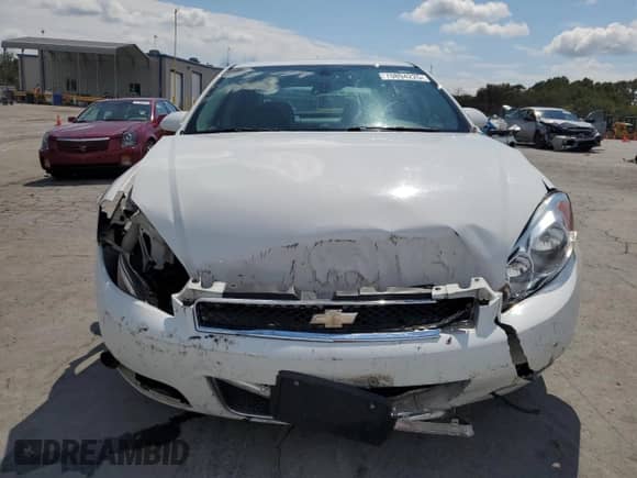 2013 Chevrolet Impala Police с VIN 2G1WD5E33D1263388, выставлен на аукционе Copart как лот 70894225 с пробегом 100 119 миль миль и Списание • Salvage title. История ставок и продаж доступна на DreamBid. Изображение 5.