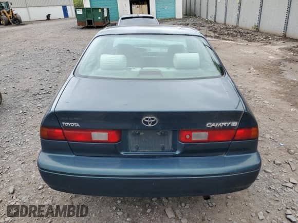 1997 Toyota Camry LE с VIN 4T1BG22K2VU069055, выставлен на аукционе Copart как лот 80131065 с пробегом 193 934 миль миль и Списание • Salvage title. История ставок и продаж доступна на DreamBid. Изображение 6.