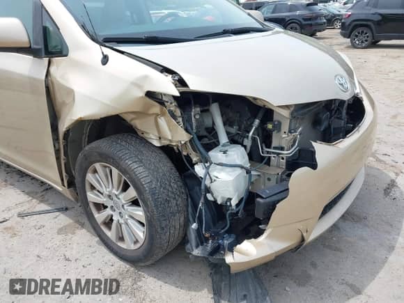 2014 Toyota Sienna Limited с VIN 5TDDK3DC2ES086353, выставлен на аукционе IAAI как лот 42462888 с пробегом 152 156 миль миль и . История ставок и продаж доступна на DreamBid. Изображение 6.