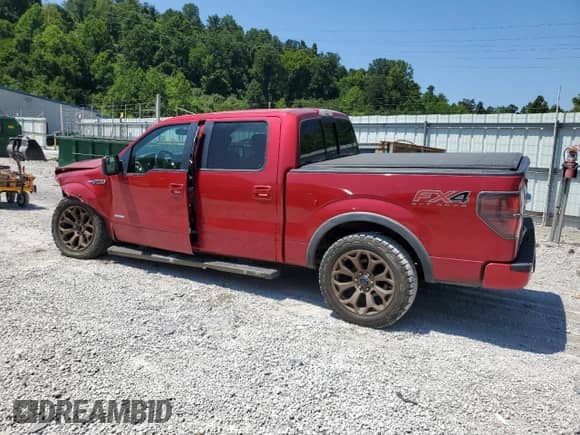 2012 Ford F-150 FX4 with VIN 1FTFW1ET7CFC91874, listed as a Copart auction lot 68002945 with 216,167 mi miles and Salvage title. Bid and sale history available at DreamBid. Image 2.