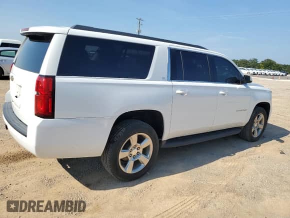 2019 Chevrolet Suburban LT с VIN 1GNSCHKC2KR289779, выставлен на аукционе Copart как лот 69132805 с пробегом 98 965 миль миль и Списание • Salvage title. История ставок и продаж доступна на DreamBid. Изображение 3.