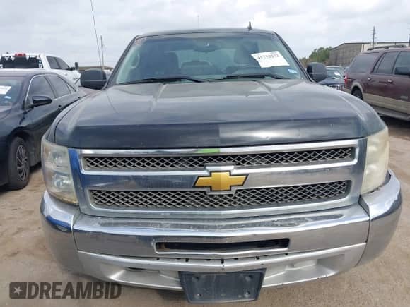 2012 Chevrolet Silverado 1500 LS z VIN 3GCPCREA7CG105775, wystawiony jako IAAI lot #41752232 z przebiegiem 271 970 mil mil oraz . Historia ofert i sprzedaży dostępna na DreamBid. Obrazek 12.
