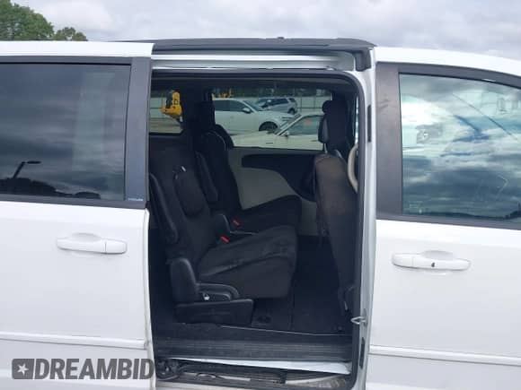 2014 Dodge Grand Caravan SXT with VIN 2C4RDGCG0ER152726, listed as a IAAI auction lot 43232494 with 162,088 mi miles and . Bid and sale history available at DreamBid. Image 8.