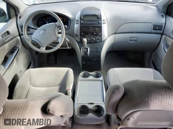 2010 Toyota Sienna CE с VIN 5TDKK4CC1AS289727, выставлен на аукционе Copart как лот 89536445 с пробегом 177 097 миль миль и Списание • Salvage title. История ставок и продаж доступна на DreamBid. Изображение 8.