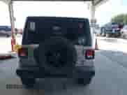 2021 Jeep Wrangler Unlimited Willys Sport with VIN 1C4HJXDG8MW722786, listed as a IAAI auction lot 43035484 with 83,071 mi miles and . Bid and sale history available at DreamBid. Image 16.