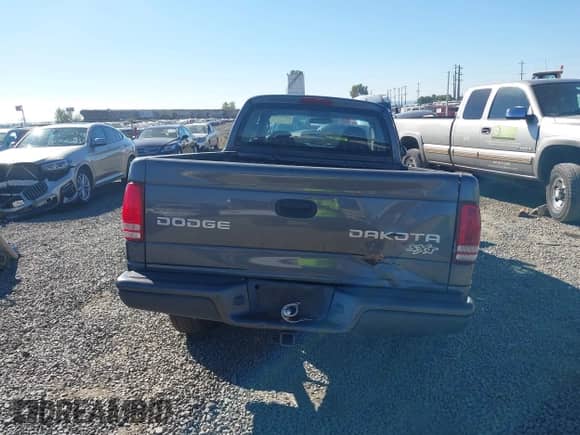 2004 Dodge Dakota with VIN 1D7HG12K64S549799, listed as a IAAI auction lot 42953180 with 128,822 mi miles and . Bid and sale history available at DreamBid. Image 17.