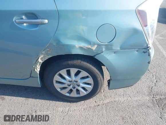 2014 Toyota Prius z VIN JTDKN3DP6E3056811, wystawiony jako IAAI lot #42934629 z przebiegiem 159 176 mil mil oraz . Historia ofert i sprzedaży dostępna na DreamBid. Obrazek 17.