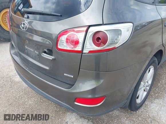 2012 Hyundai Santa Fe Limited with VIN 5XYZK4AG8CG118820, listed as a IAAI auction lot 42361850 with 298,744 mi miles and . Bid and sale history available at DreamBid. Image 6.