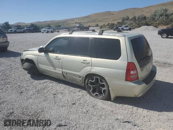 2005 Subaru Forester XT with VIN JF1SG69665H704751, listed as a Copart auction lot 63497125 with 188,843 mi miles and Salvage title. Bid and sale history available at DreamBid. Image 2.