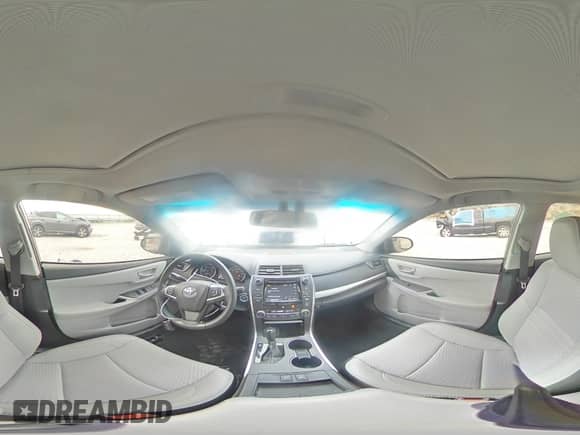 2015 Toyota Camry LE с VIN 4T1BD1FKXFU169791, выставлен на аукционе Copart как лот 71256235 с пробегом 94 734 миль миль и Списание • Salvage title. История ставок и продаж доступна на DreamBid. Изображение 14.