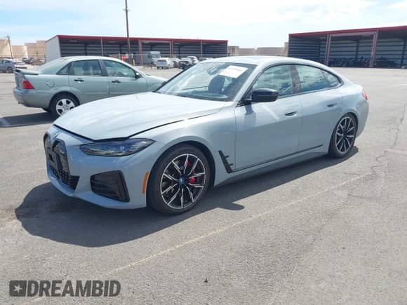 2024 BMW i4 eDrive40 with VIN WBY73AW07RFT27491, listed as a IAAI auction lot 43109104 with 10,833 mi miles and . Bid and sale history available at DreamBid. Image 2.