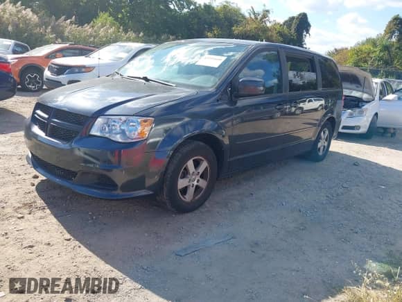2013 Dodge Grand Caravan SXT with VIN 2C4RDGCG3DR590655, listed as a IAAI auction lot 43391600 with 189,771 mi miles and . Bid and sale history available at DreamBid. Image 2.