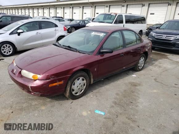 2002 Saturn SL with VIN 1G8ZH52872Z223855, listed as a Copart auction lot 76230484 with 221,107 mi miles and Non repairable. Bid and sale history available at DreamBid. Image 1.