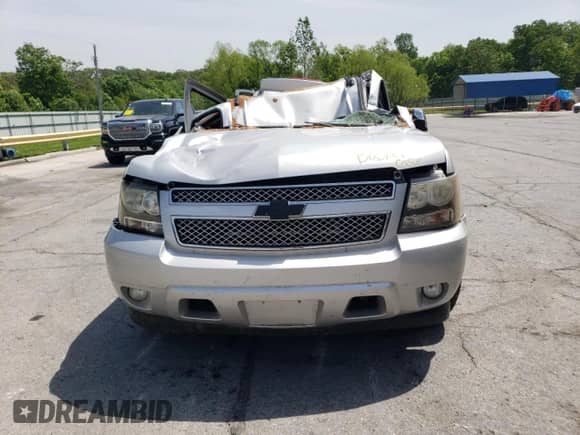 2010 Chevrolet Suburban LS с VIN 1GNUCHE02AR266754, выставлен на аукционе Copart как лот 56241955 с пробегом Не указан миль и Списание • Salvage title. История ставок и продаж доступна на DreamBid. Изображение 5.