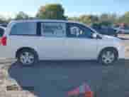 2019 Dodge Grand Caravan SXT with VIN 2C4RDGCG5KR774556, listed as a IAAI auction lot 43411147 with 164,795 mi miles and . Bid and sale history available at DreamBid. Image 13.