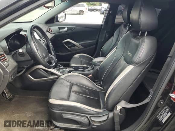 2013 Hyundai Veloster Turbo с VIN KMHTC6AE4DU171846, выставлен на аукционе Copart как лот 69561135 с пробегом Не указан миль и На запчасти • Non repairable. История ставок и продаж доступна на DreamBid. Изображение 7.