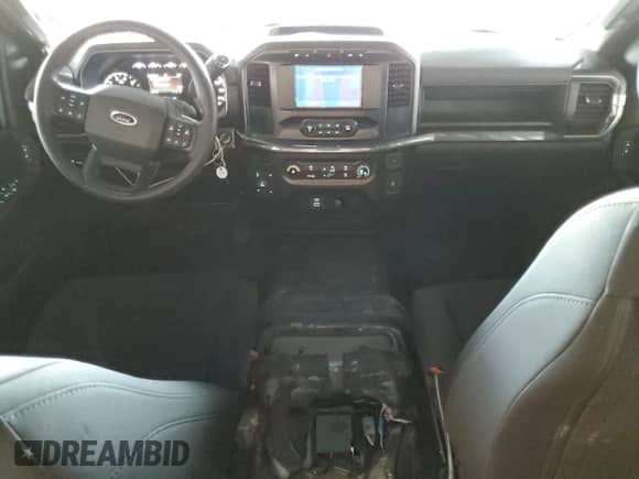 2023 Ford F-150 with VIN 1FTFW1P89PKD31166, listed as a Copart auction lot 84958565 with 50,773 mi miles and Salvage title. Bid and sale history available at DreamBid. Image 8.