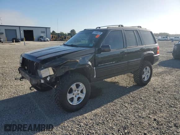 1998 Jeep Grand Cherokee Limited с VIN 1J4GZ78Y5WC190399, выставлен на аукционе Copart как лот 81995675 с пробегом 246 392 миль миль и Списание • Salvage title. История ставок и продаж доступна на DreamBid. Изображение 1.