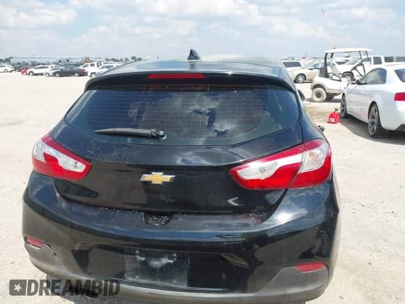 2017 Chevrolet Cruze LT z VIN 3G1BE6SM4HS555625, wystawiony jako IAAI lot #43349157 z przebiegiem 138 113 mil mil oraz . Historia ofert i sprzedaży dostępna na DreamBid. Obrazek 16.