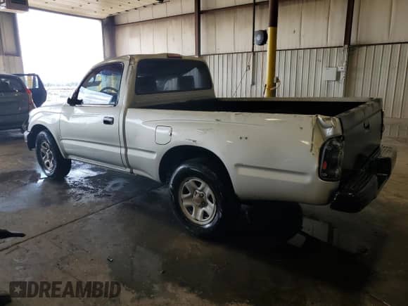 2002 Toyota Tacoma with VIN 5TENL42N72Z087380, listed as a Copart auction lot 84454855 with 291,069 mi miles and Salvage title. Bid and sale history available at DreamBid. Image 2.