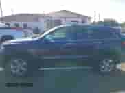 2013 Jeep Grand Cherokee Limited z VIN 1C4RJFBG4DC648995, wystawiony jako IAAI lot #43338050 z przebiegiem 138 551 mil mil oraz . Historia ofert i sprzedaży dostępna na DreamBid. Obrazek 14.