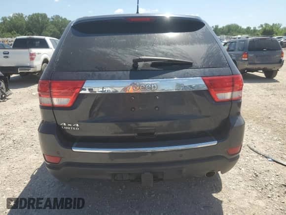 2013 Jeep Grand Cherokee Limited with VIN 1C4RJFBG5DC629923, listed as a Copart auction lot 66639035 with 136,993 mi miles and Salvage title. Bid and sale history available at DreamBid. Image 6.