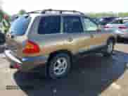 2002 Hyundai Santa Fe GLS z VIN KM8SC73DX2U270948, wystawiony jako IAAI lot #42157089 z przebiegiem 170 824 mil mil oraz . Historia ofert i sprzedaży dostępna na DreamBid. Obrazek 4.