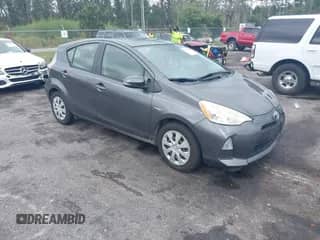 2013 Toyota Prius One with VIN JTDKDTB30D1547971, listed as a IAAI auction lot 43189377 with 164,838 mi miles and . Bid and sale history available at DreamBid. Image 1.