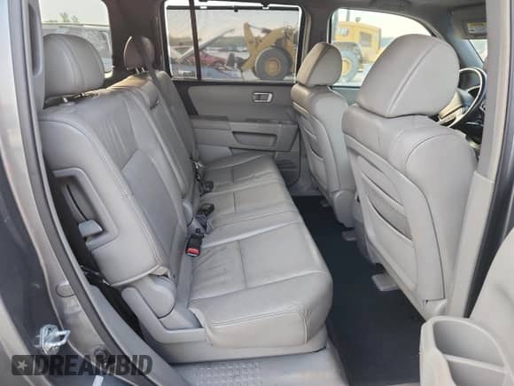 2009 Honda Pilot Touring with VIN 5FNYF38829B016406, listed as a Copart auction lot 71791575 with 221,923 mi miles and Salvage title. Bid and sale history available at DreamBid. Image 11.
