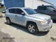 2007 Jeep Compass Sport with VIN 1J8FT47W87D158424, listed as a Copart auction lot 61333865 with 243,861 mi miles and Salvage title. Bid and sale history available at DreamBid. Image 4.