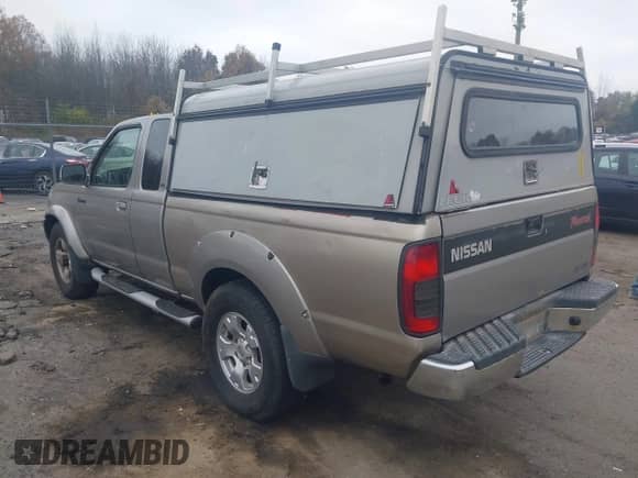 2000 Nissan Frontier XE z VIN 1N6ED26Y9YC316605, wystawiony jako IAAI lot #43573594 z przebiegiem 254 088 mil mil oraz . Historia ofert i sprzedaży dostępna na DreamBid. Obrazek 3.