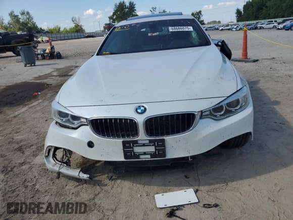 2016 BMW 4 Series 428i xDrive with VIN WBA4C9C55GG139009, listed as a Copart auction lot 68686075 with 103,761 mi miles and Salvage title. Bid and sale history available at DreamBid. Image 5.