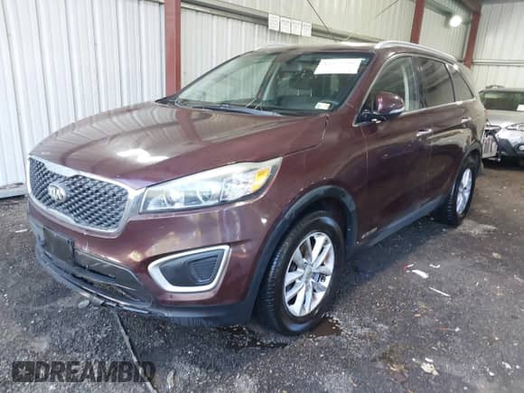 2018 Kia Sorento LX with VIN 5XYPGDA57JG338860, listed as a IAAI auction lot 43352296 with 239,757 mi miles and . Bid and sale history available at DreamBid. Image 2.