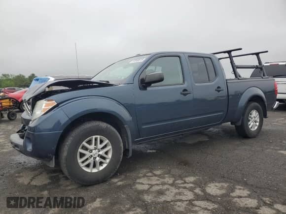 2016 Nissan Frontier SV with VIN 1N6AD0FVXGN700131, listed as a Copart auction lot 57040815 with 111,570 mi miles and Salvage title. Bid and sale history available at DreamBid. Image 1.