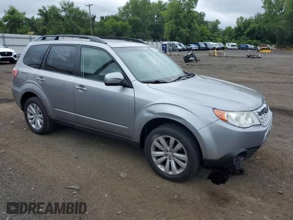 2011 Subaru Forester X Limited z VIN JF2SHAFC9BH714983, wystawiony jako Copart lot #64743385 z przebiegiem 83 771 mil mil oraz Szkoda całkowita • Salvage title. Historia ofert i sprzedaży dostępna na DreamBid. Obrazek 4.