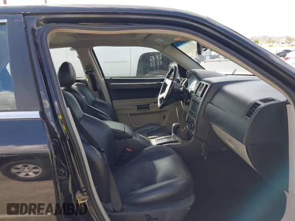 2007 Chrysler 300 C SRT-8 with VIN 2C3LA73W37H658358, listed as a IAAI auction lot 43439006 with 175,088 mi miles and . Bid and sale history available at DreamBid. Image 5.