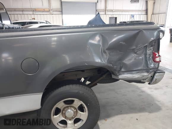 2002 Ford F-150 XL with VIN 1FTRX17292NC01028, listed as a IAAI auction lot 43277265 with Not provided miles and . Bid and sale history available at DreamBid. Image 6.