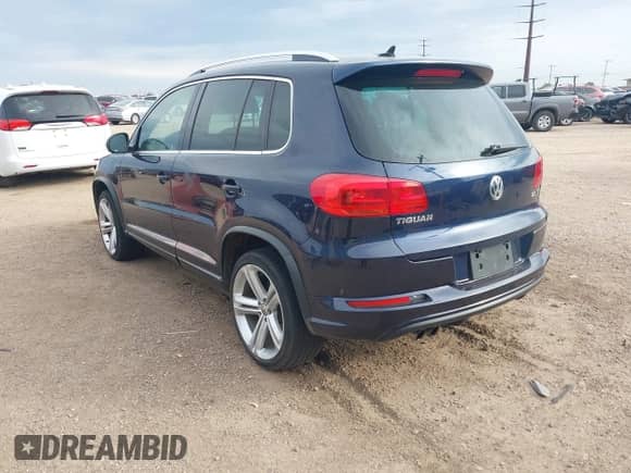 2015 Volkswagen Tiguan S with VIN WVGAV7AX7FW093868, listed as a IAAI auction lot 43143969 with 116,252 mi miles and . Bid and sale history available at DreamBid. Image 3.
