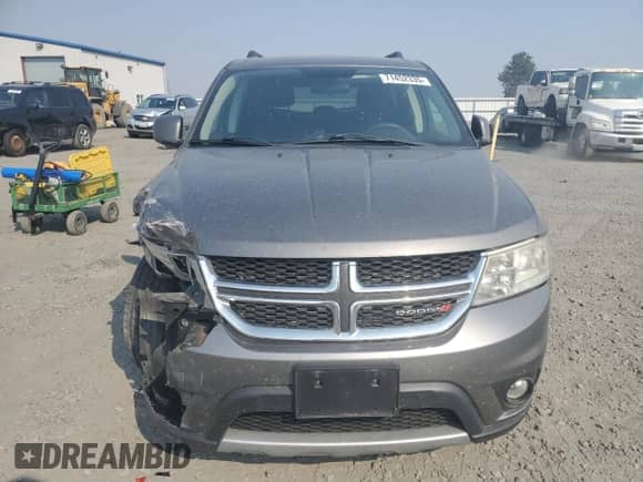 2013 Dodge Journey SXT с VIN 3C4PDDBG7DT638520, выставлен на аукционе Copart как лот 71452335 с пробегом Не указан миль и Списание • Salvage title. История ставок и продаж доступна на DreamBid. Изображение 5.
